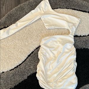 White one sleeve, side cut out runched spandex dress.